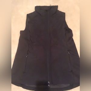 Black lightweight, hip-length vest, size M